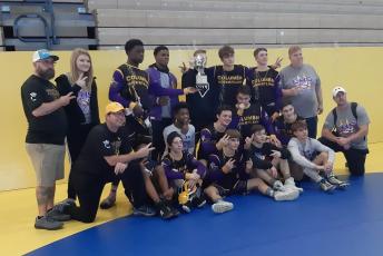 Columbia's wrestling team after placing second at the Hurricane Cup Duals on Saturday. (COURTESY)