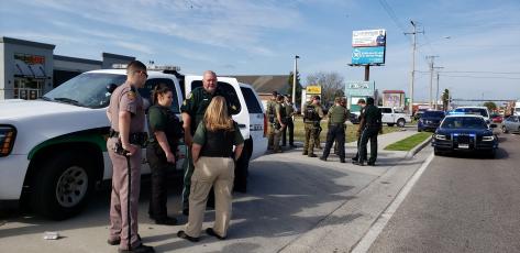 Columbia County deputies and state troopers hold their positions on U.S. Highway 90 on Tuesday. The search for Gooch took roughly two hours. (COURTESY CCSO)
