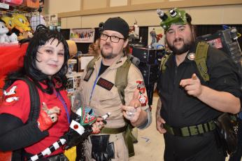 North Florida Ghostbusters Whitney Katz, Mike Vanderburg and Nick Vitale take a quick break from vanquishing the spirits of the Robert B. Harkness National Guard Armory to pose for a photo at last year’s Infinity Con. (FILE)