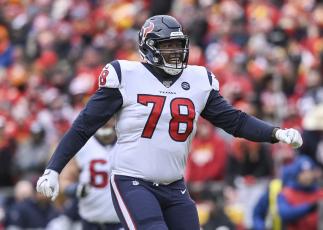 Houston Texans left tackle Laremy Tunsil (78) celebrates his team’s touchdown against the Kansas City Chiefs on Jan. 12 in Kansas City, Mo. (REED HOFFMANN/Associated Press)