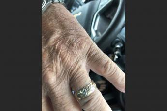 Tommy Smith models his recovered wedding band. (COURTESY)