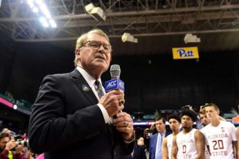 ACC Commissioner John Swofford announces the cancelation of the remainder of the men's basketball ACC Tournament at Greensboro Coliseum on March 12, in Greensboro, N.C. (JARED C. TILTON/Getty Images/TNS)