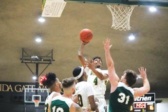 FGC guard Tay Cobb puts up a floater against Webber International this past season. (FILE)