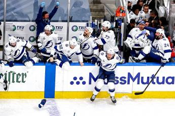 The Tampa Bay Lightning celebrate defeating the Dallas Stars 2-0 to win the 2020 NHL Stanley Cup Final at Rogers Place on Monday, in Edmonton, Alberta. (BRUCE BENNETT/Getty Images/TNS)