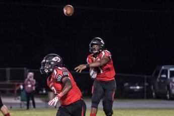 Fort White quarterback Tyler Jefferson throws a pass against Taylor County on Oct. 2. (CHRISTINA FEAGIN/Special to the Reporter)