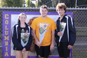 Columbia swimmers Mackenzie Conklin, Alex Jewett and R.J. Dutch were honored on Senior Night during Tuesday’s meet against Suwannee. (SHELBY CONKLIN/Special to the Reporter)