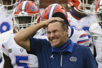 Florida head coach Dan Mullen reacts during the second half of a game against Mississippi on Sept. 26 in Oxford, Miss. (THOMAS GRANING/Associated Press) 