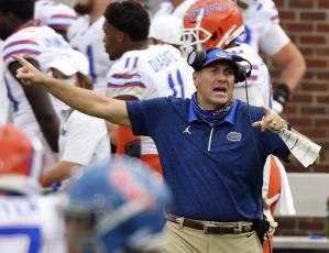 Florida head coach Dan Mullen reacts during the second half of a game against Mississippi on Sept. 26 in Oxford, Miss. No. 10 Florida resumed meetings and practices for the first time in two weeks Monday. They got back to work after a covid-19 outbreak caused the Southeastern Conference to postpone two of the team’s games. (AP FILE PHOTO)