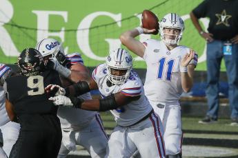 Florida Gators quarterback Kyle Trask throws a pass against the Vanderbilt Commodores last Saturday in Nashville, Tennessee. Florida won, 38-17. (FREDERICK BREEDON/Getty Images/TNS)