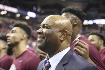Florida State's head coach Leonard Hamilton celebrates with his team their first ever ACC championship after a game against Boston College on March 7 in Tallahassee. (AP FILE PHOTO)
