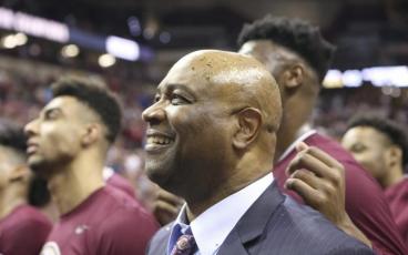 Florida State's head coach Leonard Hamilton celebrates with his team their first ever ACC championship after a game against Boston College on March 7 in Tallahassee. (AP FILE PHOTO)