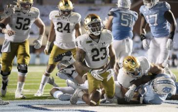Notre Dame's Kyren Williams (23) reacts after scoring on a 1-yard carry against North Carolina on Nov. 27 in Chapel Hill, N.C. (ROBERT WILLET/The News & Observer via AP, Pool)