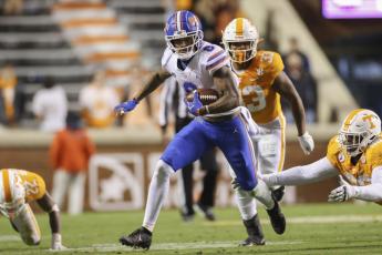 Florida wide receiver Trevon Grimes (8) runs with the ball against Tennessee on Saturday in Knoxville, Tenn. (RANDY SARTIN/Knoxville News Sentinel via AP, Pool)