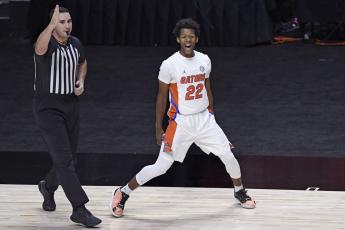 Florida's Tyree Appleby celebrates his basket putting Florida ahead for the first time in Wednesday's game against Army in Uncasville, Conn. (JESSICA HILL/Associated Press)