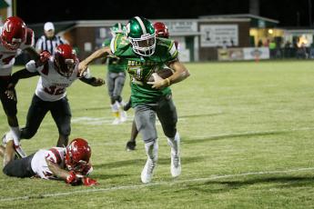 Suwannee receiver Camdon Frier runs up the field after a catch against Bradford this past season. (PAUL BUCHANAN/Special to the Reporter)