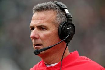 Former Ohio State Buckeyes coach Urban Meyer is reportedly near a deal to become the Jacksonville Jaguars new coach. (MIKE MULHOLLAND/TNS)