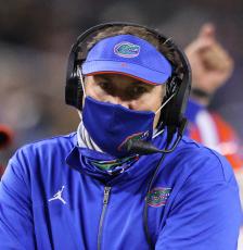 Florida head coach Dan Mullen looks on during the third quarter against Oklahoma in the Cotton Bowl at AT&T Stadium on Dec. 30, 2020, in Arlington, Texas. (RONALD MARTINEZ/Getty Images/TNS)