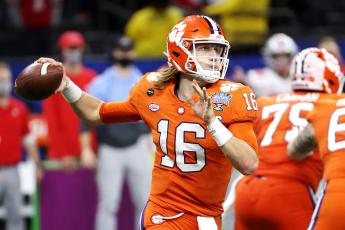 Clemson Tigers quarterback Trevor Lawrence (16) passes against the Ohio State Buckeyes in the second half of the College Football Playoff semifinal at the Allstate Sugar Bowl at Mercedes-Benz Superdome on Jan. 1 in New Orleans, Louisiana. (CHRIS GRAYTHEN/Getty Images/TNS)