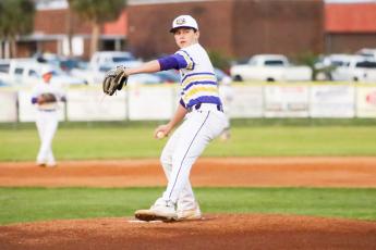 Columbia pitcher Truitt Todd winds up to pitch against Stanton on March 9. (BRENT KUYKENDALL/Lake City Reporter)
