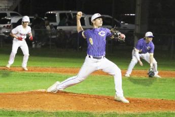 Columbia pitcher Truitt Todd hurls to the plate against Santa Fe during the fifth inning Friday night in Alachua. (MORGAM MCMULLEN/Lake City Reporter)