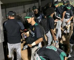 Suwannee’s baseball team exits the dugout following Tuesday’s loss to Santa Fe in the District 2-4A semifinals. (MARTY PALLMAN/Special to the Reporter)