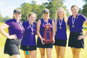 Columbia’s girls golf team won the District 2-2A title this past season, the first since 2014. at Quail Heights. Coach Tammy Winnett (middle) resigned as the team's coach on Tuesday. (FILE)