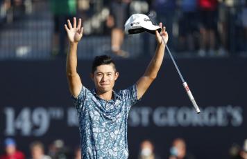 Collin Morikawa celebrates on the 18th green after winning the British Open at Royal St George's golf course on Sunday Sandwich, England. (PETER MORRISON/Associated Press)