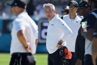 Jacksonville Jaguars head coach Urban Meyer looks down the sidelines during a game against the Arizona Cardinals at TIAA Bank Field on Sept. 26 in Jacksonville. (BOB SELF/Florida Times-Union/TNS)