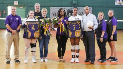 Columbia seniors Danielle Thomson (4) and Brandi Oliver (7) were honored for Senior Night prior to Tuesday’s match against Fort White. (BRENT KUYKENDALL/Lake City Reporter)