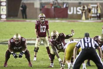 Florida State quarterback McKenzie Milton (10) waits for the snap in overtime against Notre Dame on Sunday in Tallahassee. Notre Dame won 41-38. (PHIL SEARS/Associated Press)