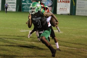 Suwannee running back Malachi Graham returns kickoff for a touchdown against Westside on Friday night. (PAUL BUCHANAN/Special to the Reporter)