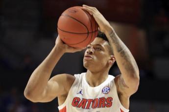 Florida forward Keyontae Johnson (11) takes a shot against Baylor on Jan. 25, 2020, in Gainesville. Johnson hasn't practiced or played since collapsing on the court last December. (AP FILE)
