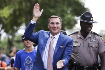 Florida head coach Dan Mullen arrives for a game against the Alabama Crimson Tide at Ben Hill Griffin Stadium on Sept. 18 in Gainesville. (JAMES GILBERT/Getty Images/TNS)