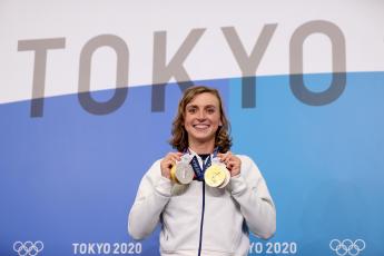 Katie Ledecky displays her two Gold and two Silver medals after a news conference during the Tokyo Olympic Games on July 31 in Tokyo. (LAURENCE GRIFFITHS/Getty Images/TNS)