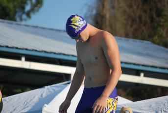 Columbia swimmer Jayden Drew gets ready on the block prior to swimming the 50 freestyle against Yulee on Tuesday. (COURTESY)