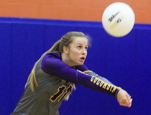 Columbia’s Ella Sparks returns a shot against Branford on Sept. 29. (PAUL BUCHANAN/Special to the Reporter)