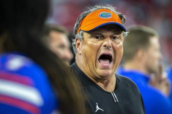 Florida defensive coordinator Todd Grantham coaches from the sideline during a game against Georgia on Oct. 30 in Jacksonville. (STEPHEN B. MORTON/Atlanta Journal-Constitution via AP)