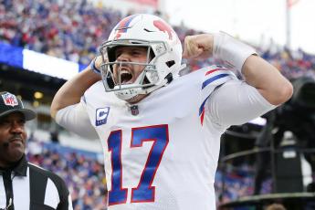 Buffalo Bills quarterback celebrates after scoring a touchdown against the Miami Dolphins at Highmark Stadium on Oct. 31 in Orchard Park, N.Y. (JOSHUA BESSEX/Getty Images/TNS)