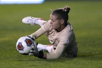 Florida State goalkeeper Cristina Roque makes a save on a kick by BYU during the NCAA College Cup women's soccer final on Monday in Santa Clara, Calif. (TONY AVELAR/Associated Press)