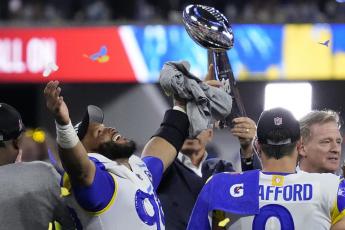 Los Angeles Rams defensive end Aaron Donald (99) celebrates after winning Super Bowl 56 over the Cincinnati Bengals on Sunday in Inglewood, Calif. The Rams won 23-20. (JULIO CORTEZ/Associated Press)