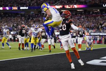 Los Angeles Rams wide receiver Cooper Kupp catches a touchdown against Cincinnati Bengals cornerback Eli Apple in Super Bowl 56 on Sunday in Inglewood, Calif. (MARCIO JOSE SANCHEZ/Associated Press)