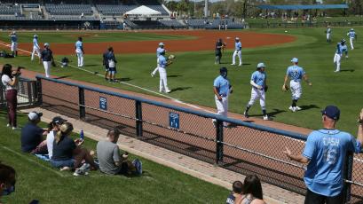 The Tampa Bay Rays are shown warming up before a game in February 2021 in Port Charlotte. (LUIS SANTANA/TNS)
