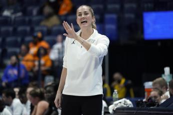 Florida head coach Kelly Rae Finley directs her players during a game against Mississippi at the Southeastern Conference tournament on March 4 in Nashville, Tenn. (MARK HUMPHREY/Associated Press)