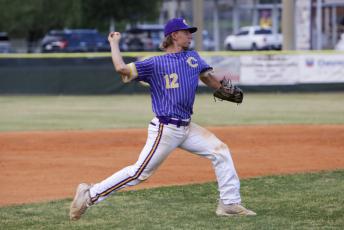 Columbia third baseman Ty Jackson throws to first base for an out against Middleburg on April 14. (BRENT KUYKENDALL/Lake City Reporter)