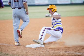 Columbia outfielder Kade Jackson slides safely into third base during Monday’s game against St. Augustine. (BRENT KUYKENDALL/Lake City Reporter)