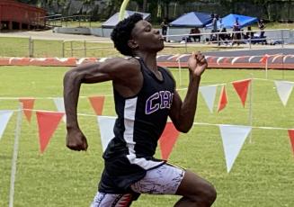 Columbia’s Jasper White placed second in 100m and third in the 200m at Santa Fe’s Last Chance meet on Saturday. (DYLAN ASPENWALL/Special to the Reporter)