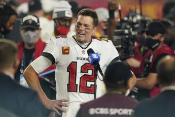 Tampa Bay Buccaneers quarterback Tom Brady is interviewed on the field after winning Super Bowl 55 against the Kansas City Chiefs on Feb. 7, 2021, in Tampa. (AP File)