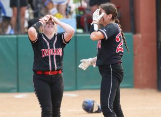  Fort White outfielder Gracie Clemons (left) reacts next to pitcher Kadence Compton after making the final out of the Class 1A state championship against Jay at Legend Way Ballfields on Wednesday in Clermont. The Royals won 6-5, holding on after the Indians loaded the bases with two outs in the seventh inning. (MORGAN MCMULLEN/Lake City Reporter)