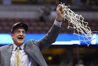 Oklahoma head coach Lon Kruger cuts down the net after their win against Oregon in the regional finals of the NCAA Tournament on March 26, 2016, in Anaheim, Calif. Kruger, who also led Florida to a Final Four, is part of a star-studded cast of coaches who will be inducted into the National College Basketball Hall of Fame in November. (AP FILE)