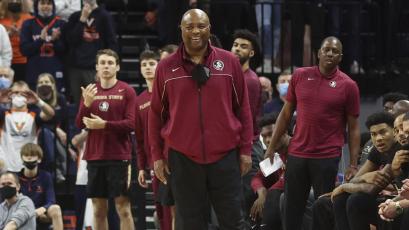 Florida State head coach Leonard Hamilton smiles from the bench during a a game against Virginia on Feb. 26 in Charlottesville, Va. (AP FILE)